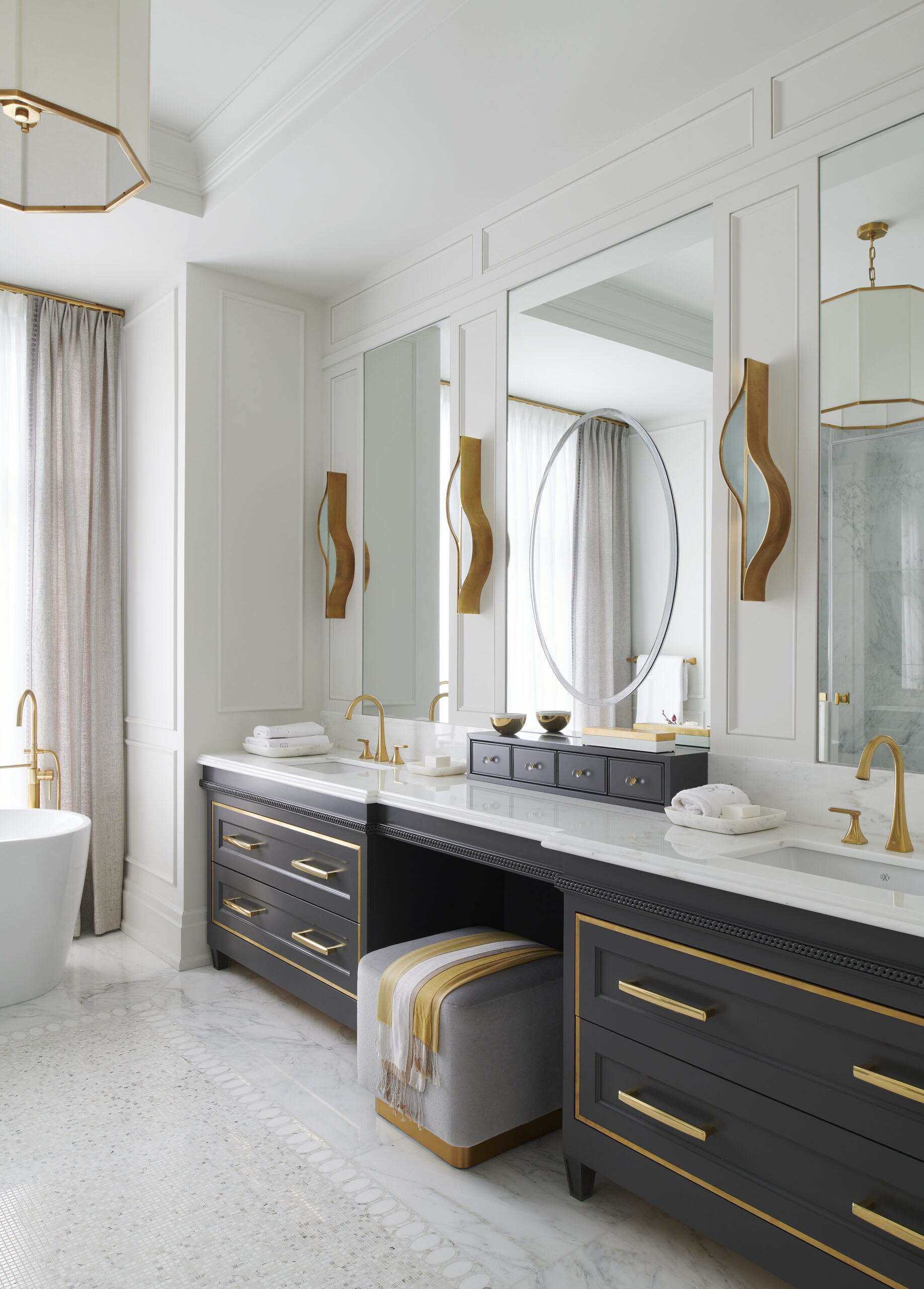 Luxury bathroom with black cabinets
