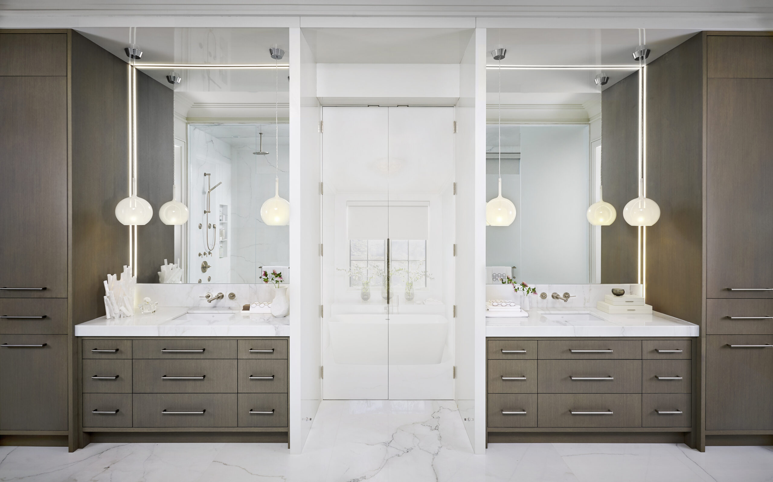 Two vanities on either side of bathroom entrance