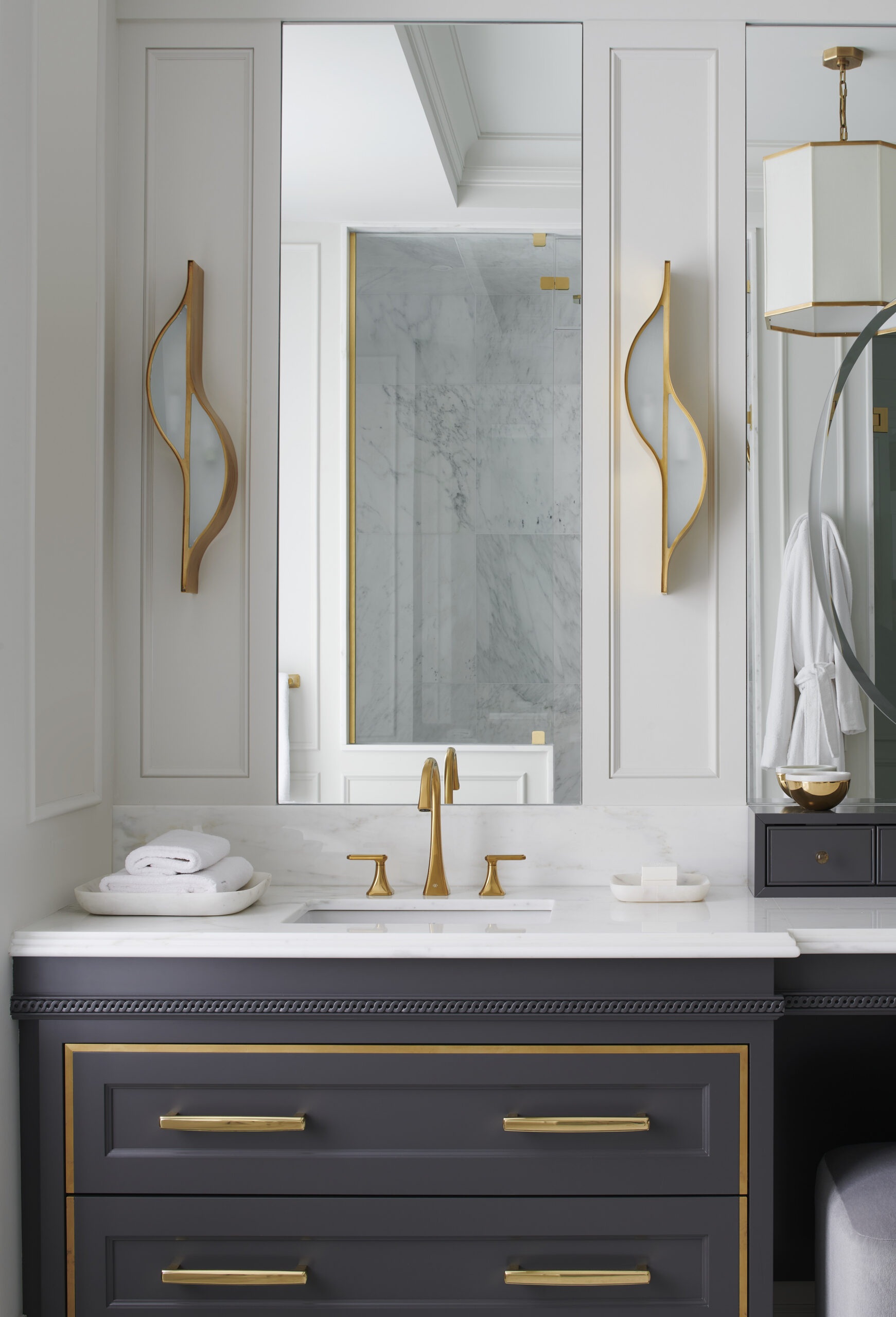 Luxury bathroom with black cabinets