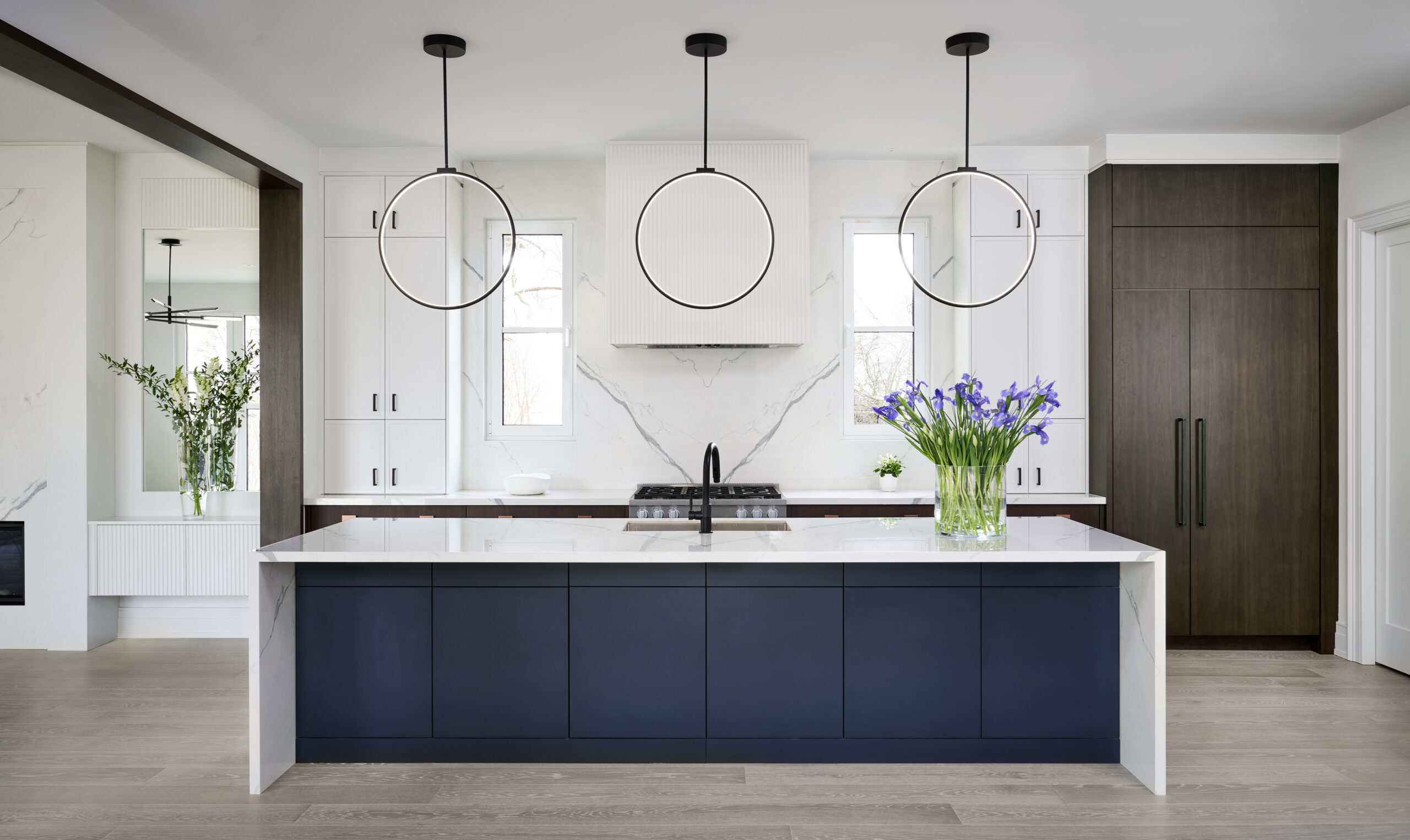 Wide view of kitchen with large island