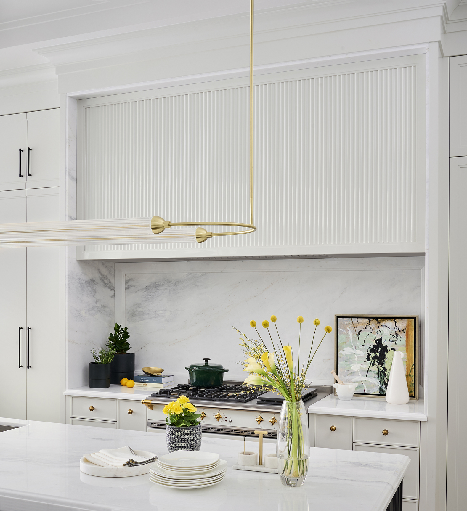 Black Tie - Modern kitchen with burner stove and marble back splash