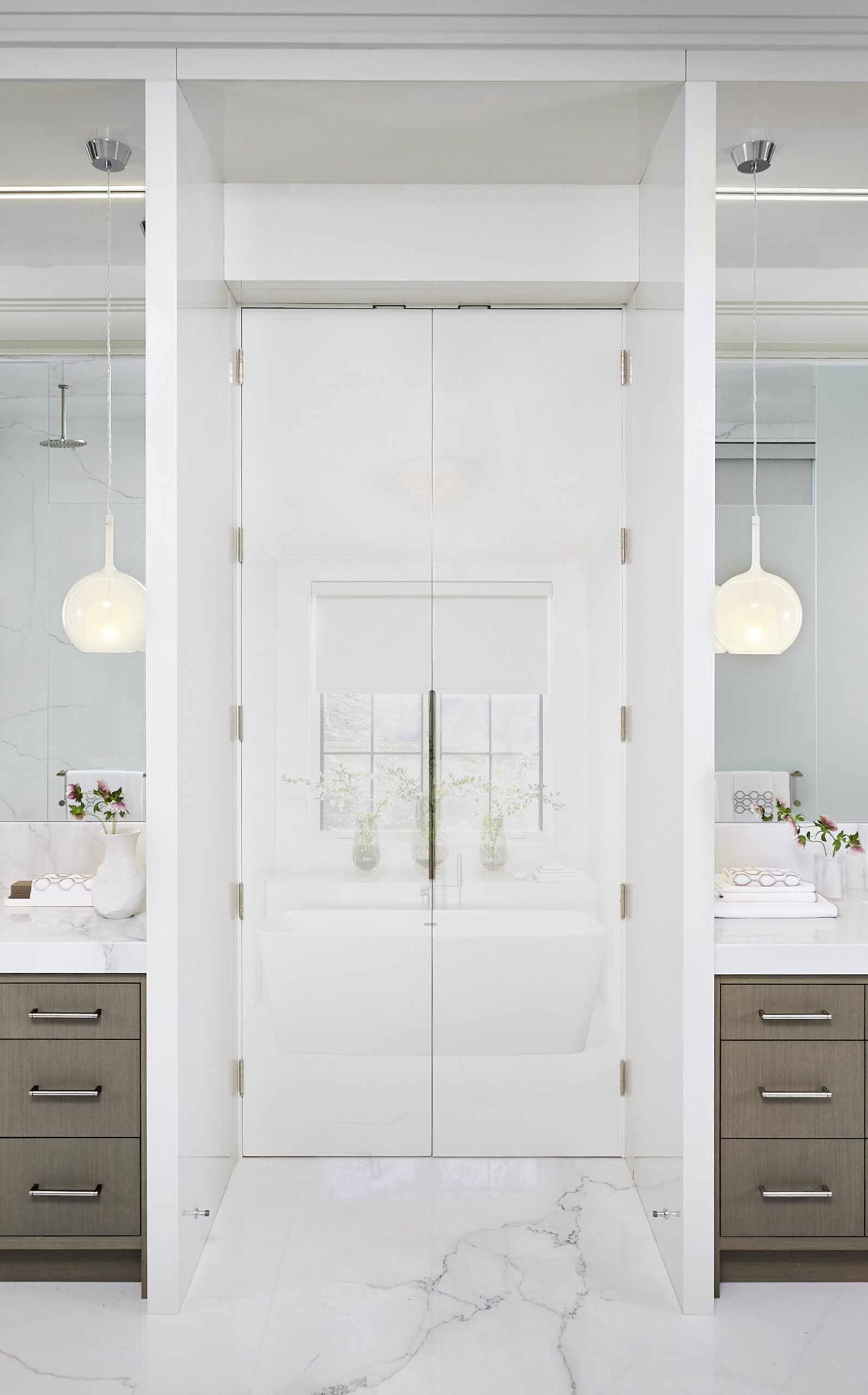 Two vanities on either side of bathroom entrance