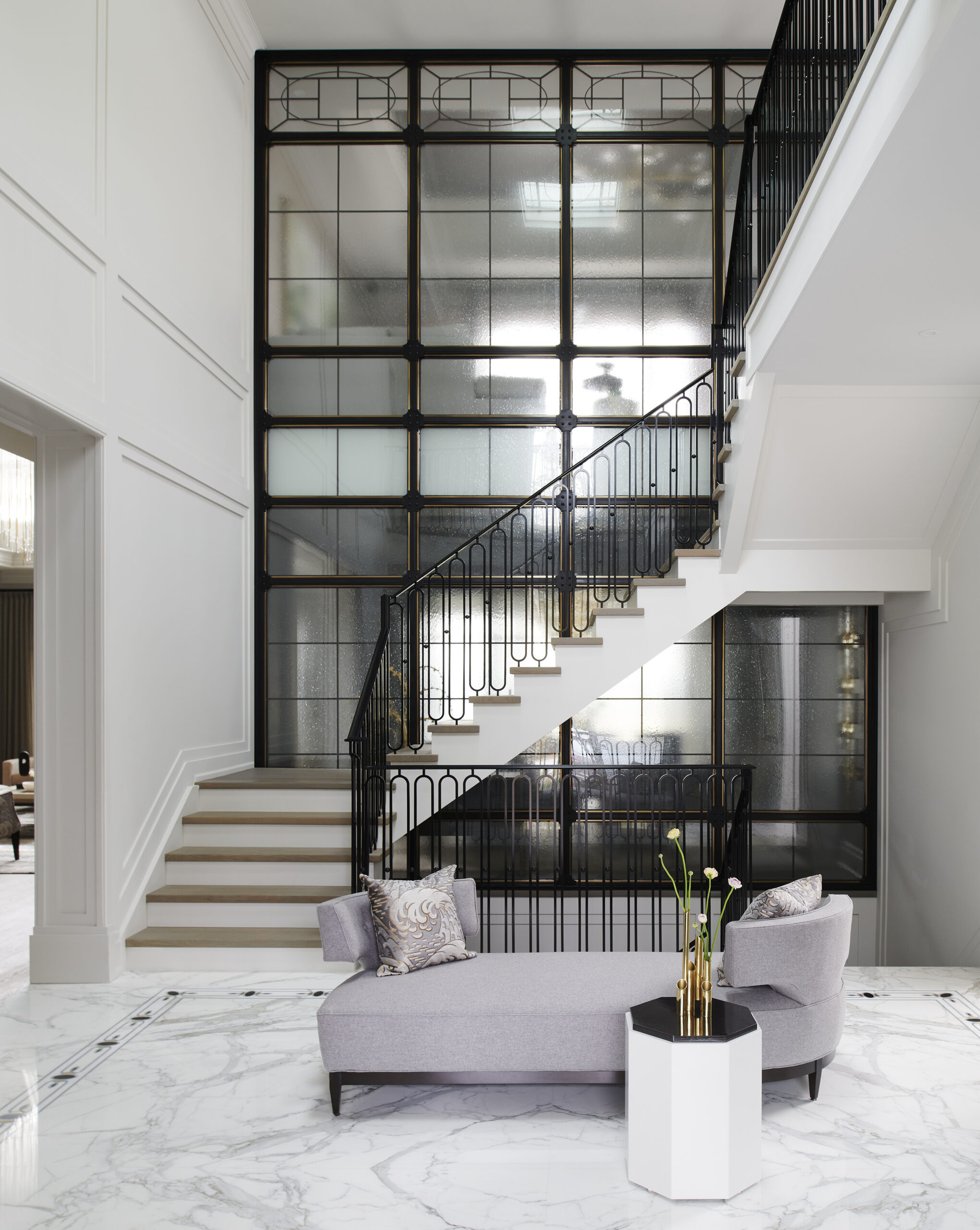 Chateau on the Lake - glass wall and stairs
