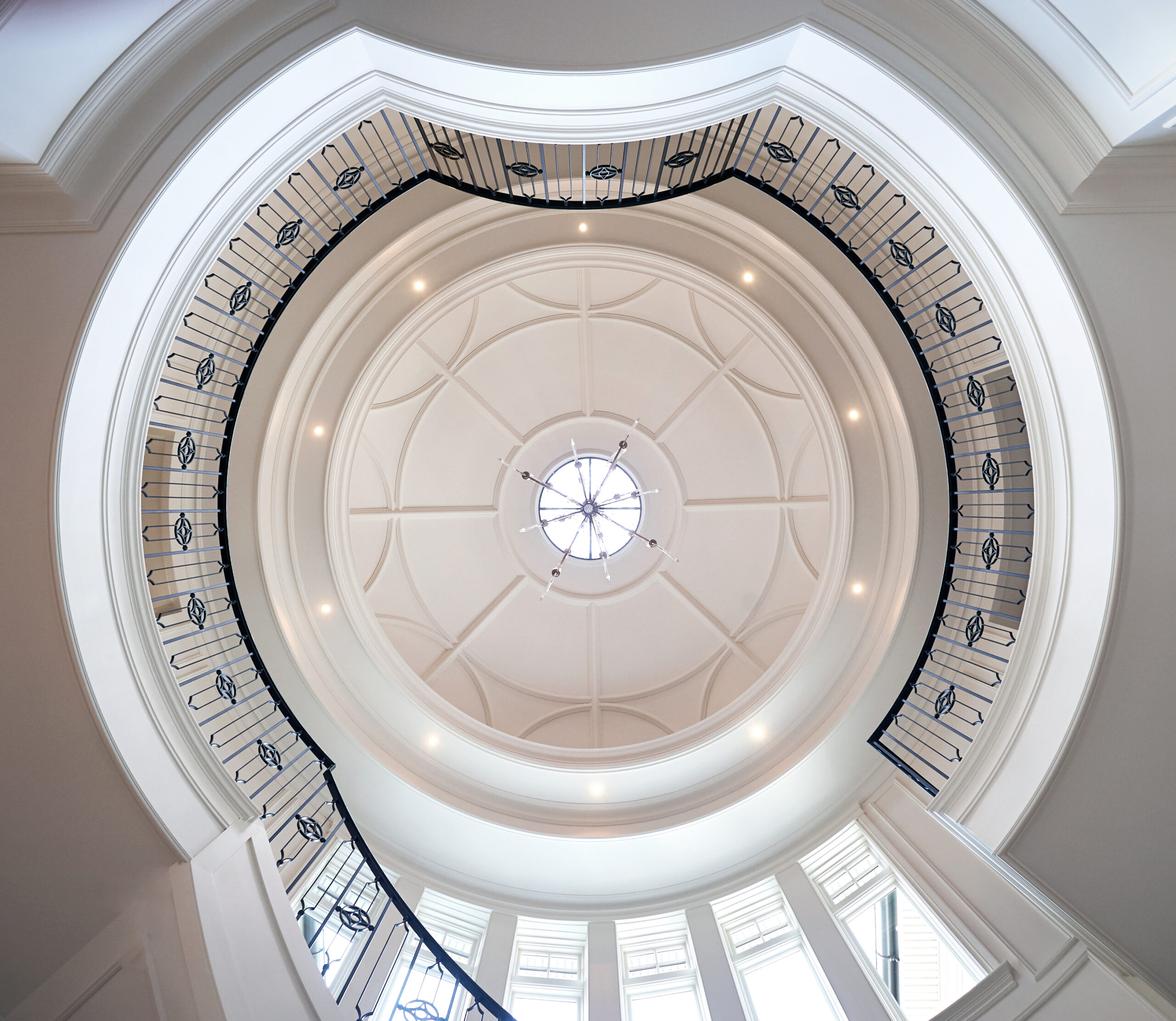 Ceiling view from the bottom of a circular staircase