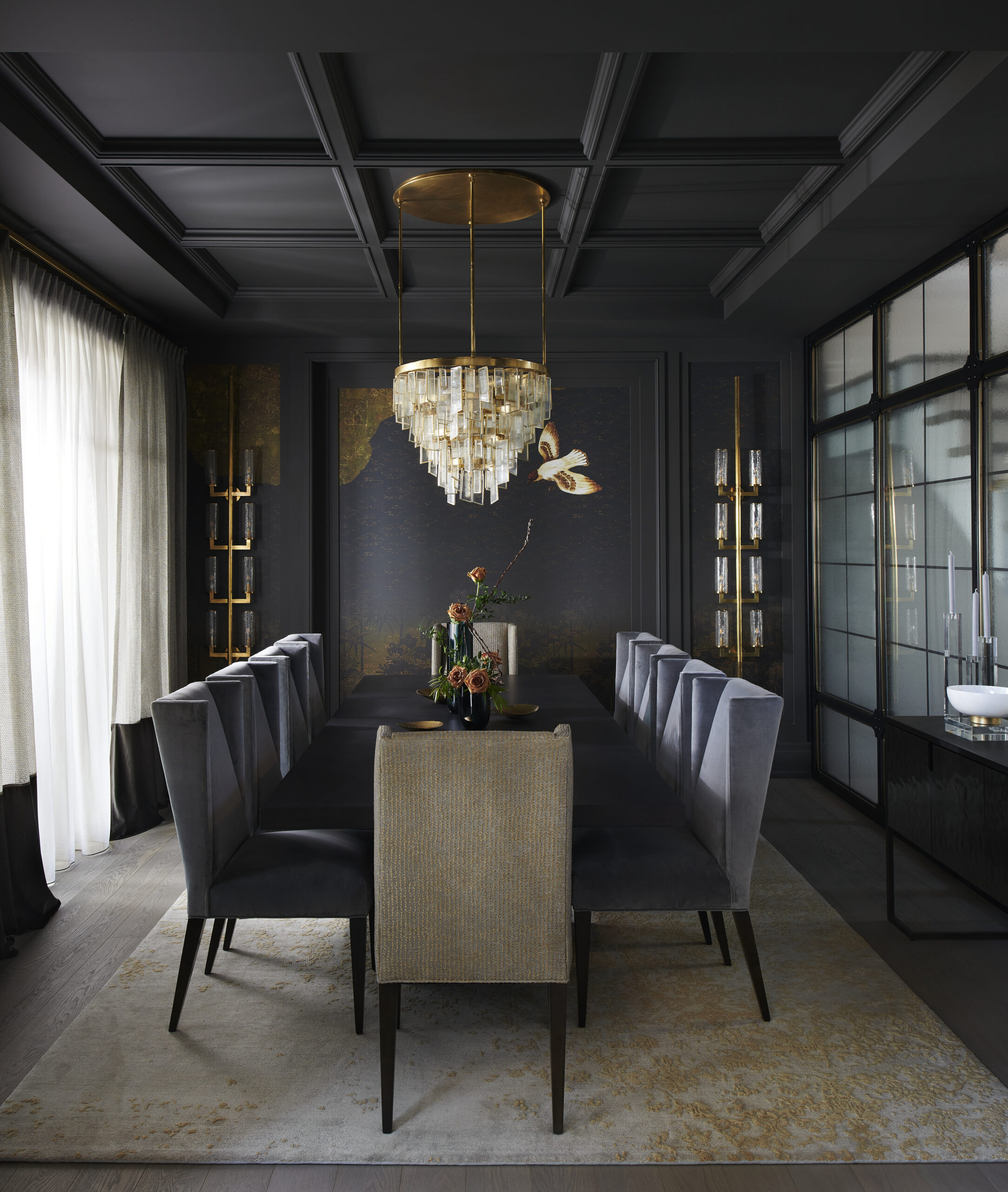 Chateau on the Lake - Dinning room with dark walls and grey chairs