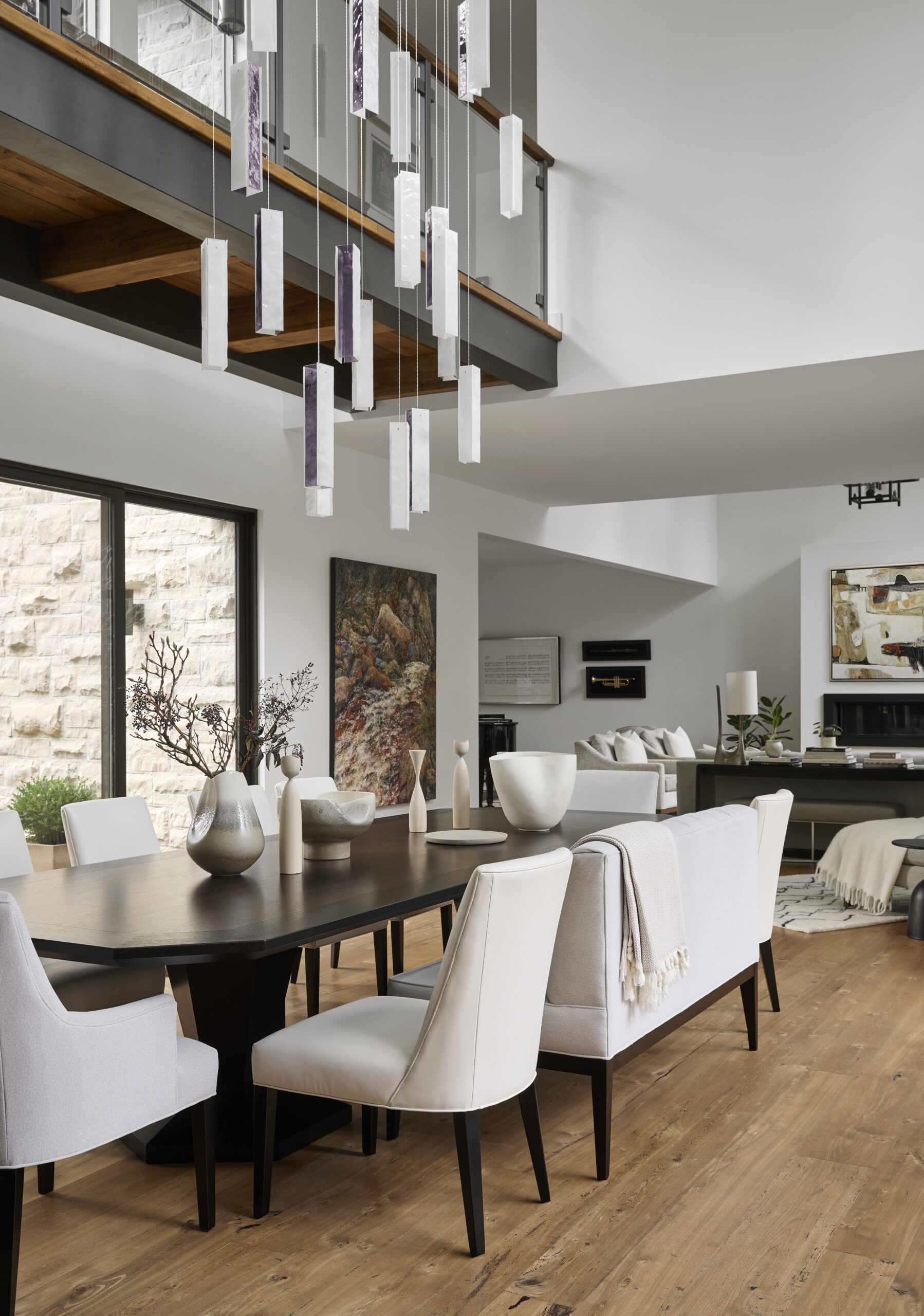 Open concept dining room with living room in the background