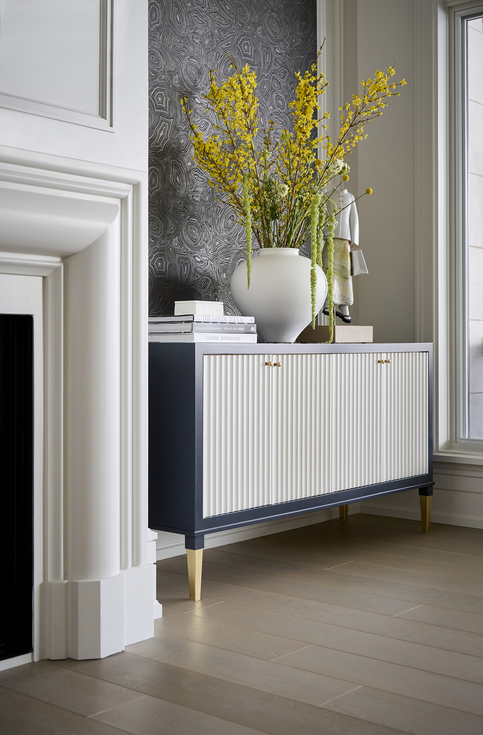 Fireplace wall with custom RSd furniture and vivacious florals